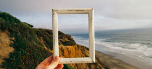 Coastal image with a picture frame in the middle